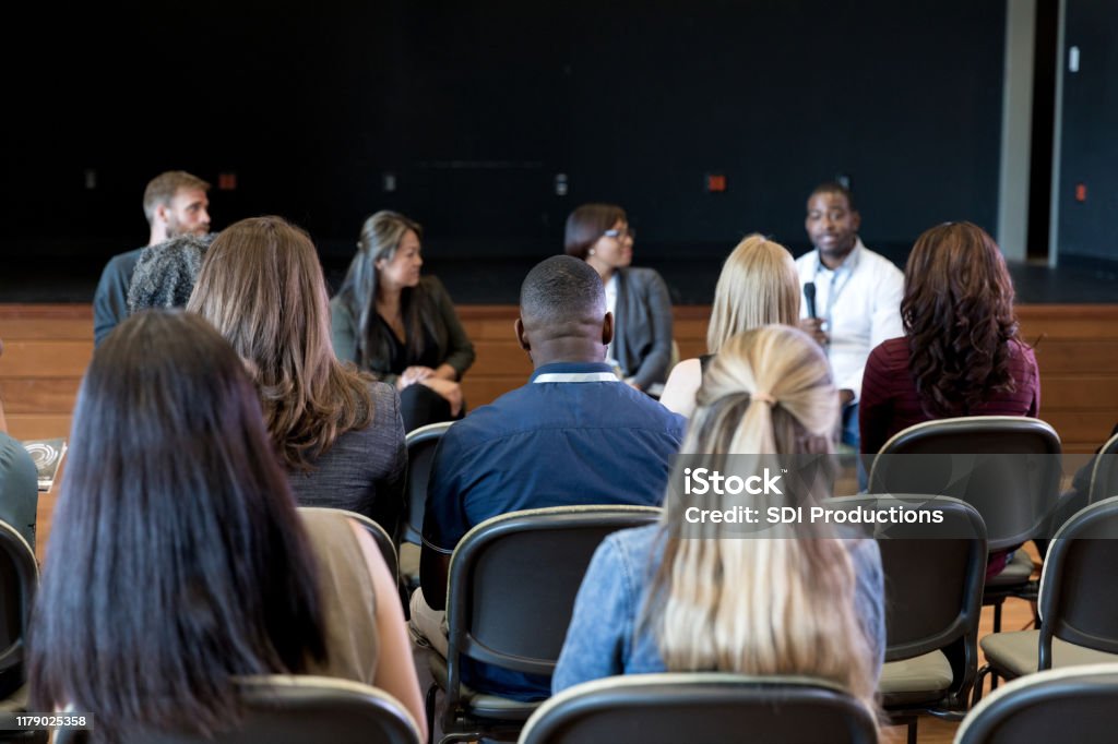 A woman speaking at a community gathering